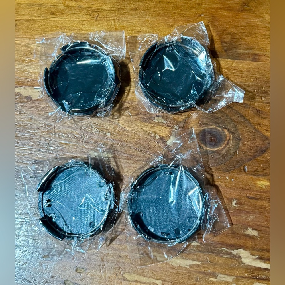 New Toyota black hub cap covers, set of 4. - Picture 3 of 4